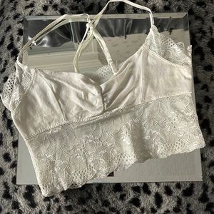Cute POOF NWOT little white lace and cotton stretchy crop top or bralette.